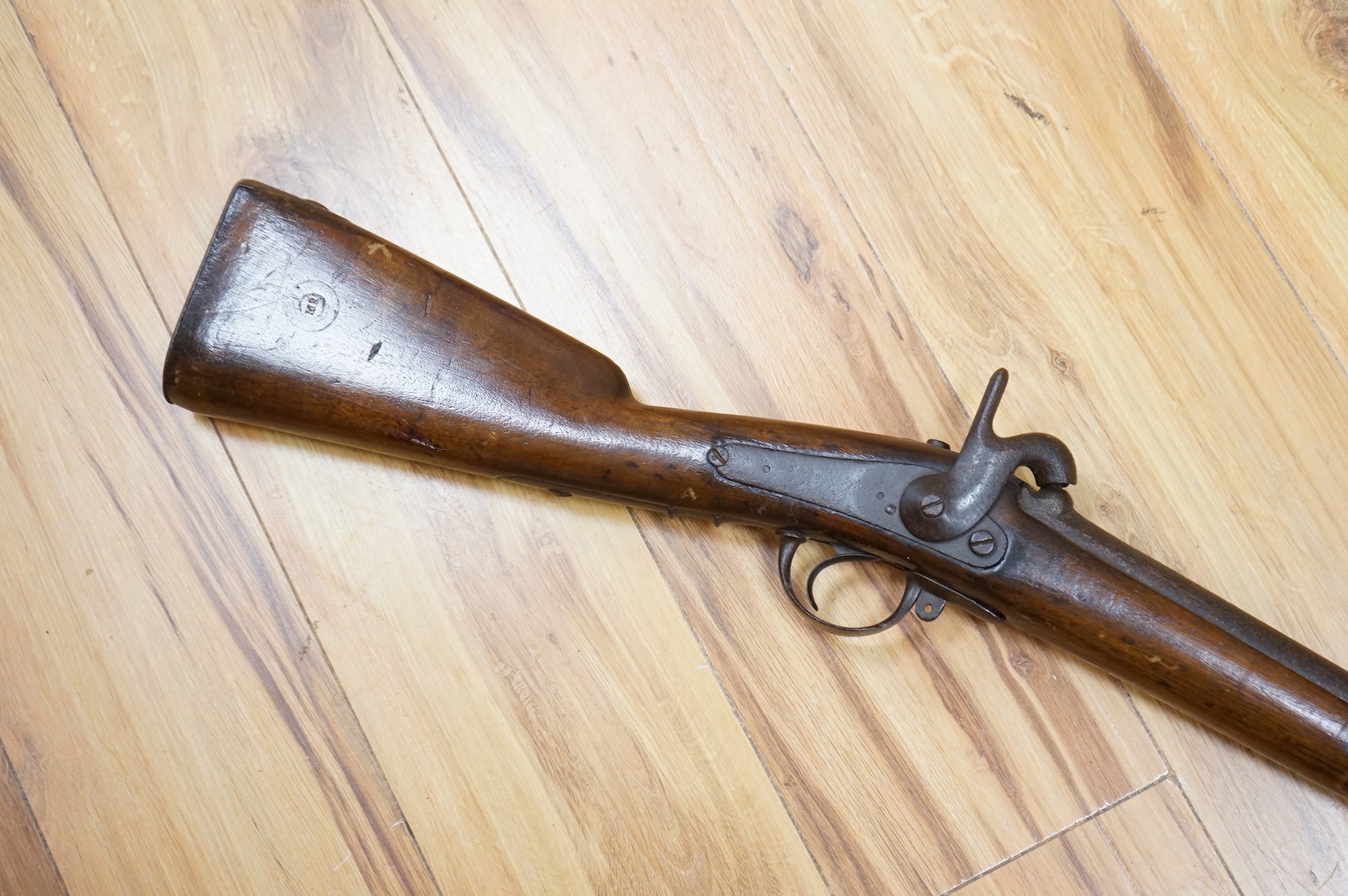 A 12 bore single barrel, back action, continental military percussion musket, barrel 93cm, possibly Russian, with regulation iron mounts and brass fore cap dated 1838